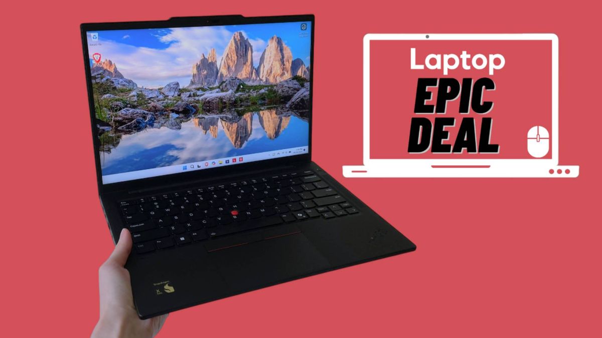 Laptop reviewer holding Lenovo ThinkPad T14s Gen 6 aginst red background