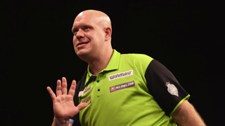 Michael van Gerwen of Netherlands reacts to a shot ahead of the World Matchplay Darts 2024