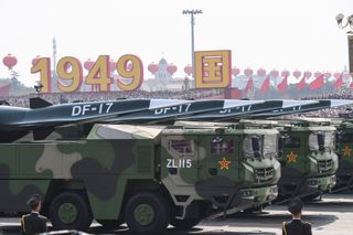 Military vehicles carrying DF-17 missiles parade through Tiananmen Square in Beijing on Oct. 1, 2019, celebrating the 70th anniversary of the founding of the Peoples Republic of China.