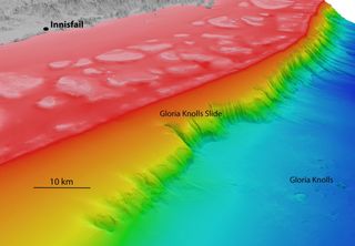 A view of the Gloria Knolls Slide off Queensland, Australia, and adjacent seafloor features; colors represent the depth of the features beneath the water surface (red is the shallowest, indicating the tallest features, while purple and blue are the deepes