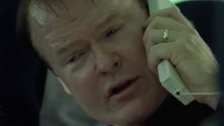 A man calls his loved one on the plane phone in United 93's trailer