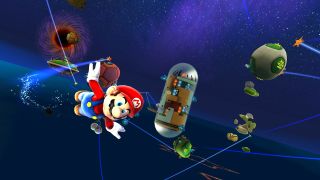 A screenshot from Super Mario 3D All-Stars, showing Mario flying past planetoids in Super Mario Galaxy