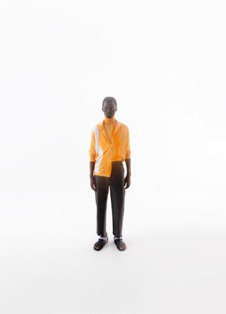 Man wearing Véronique Nichanian Hermès menswear on white background