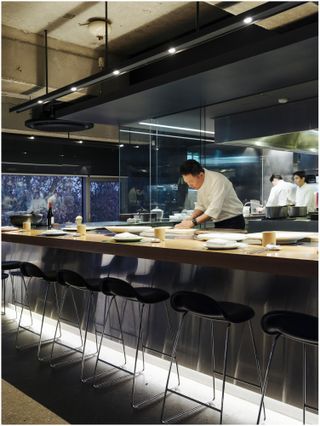 chef at work in open kitchen