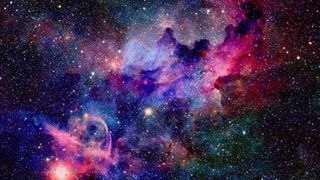 A colorful shot of nebula and stars in deep space.