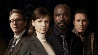 The cast of &quot;Evil&quot; season 4: (From left to right) Michael Emerson (as Leland Townsend), Kate Herbers (Kristen Bouchard), Mike Colter (David Acosta) and Aasif Mandvi (Ben Shakir)