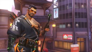 Hanzo wearing sunglasses and staring into camera