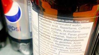 close up on the nutrition label on a bottle of diet pepsi, which includes &quot;aspartame&quot; as ingredient