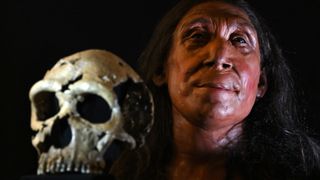 A facial reconstruction from a Neanderthal skull, next to the skull itself