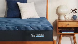 The Serta iSeries Mattress in a sunny, neutral bedroom