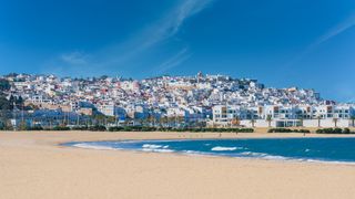 Tangier beach with the white Medina in the background