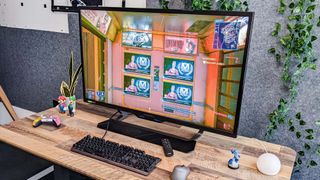 Acer Predator CG437K gaming monitor on desk