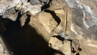 A photo of where the ritual sticks were found in the cave