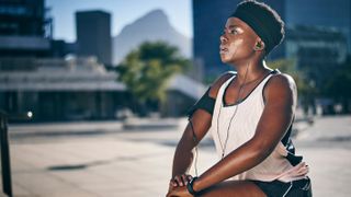 Woman wearing a fitness tracker during a workout