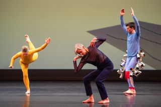 Three dancers on stage