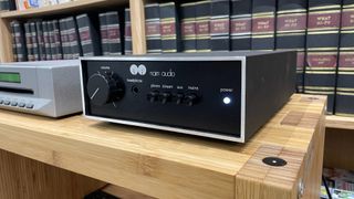 Naim Nait 50 amp on hi-fi rack with Cyrus CDi player