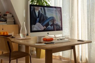 iMac on a dining table