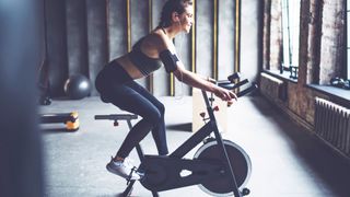 Woman on an exercise bike during workout