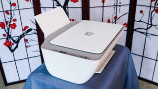 HP DeskJet 2755e on table in livingroom