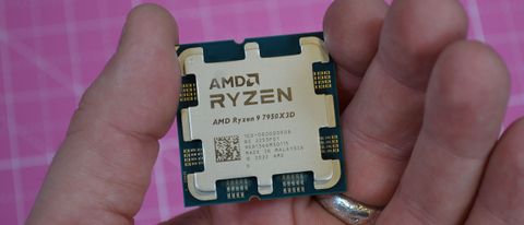 An AMD Ryzen 9 7950X3D held between a man&#039;s fingers