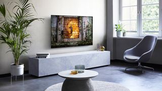 4K resolution TV mounted on a wall showing action scene