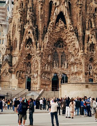 entrance of la sagrada familia by antoni gaudi