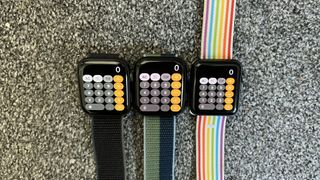 Apple Watch Series 7 next to SE and Watch 3.