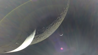 The Earth is visible as a crescent in the minutes after Orion finished its engine burn around the moon on Dec. 5, 2022.