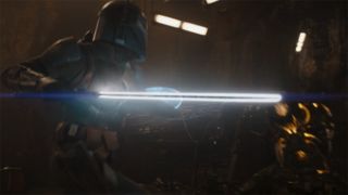 Bo-Katan wielding the darksaber in The Mandalorian season 3 episode 2.