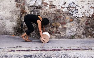 Performance artist Regina José Galindo creating artwork