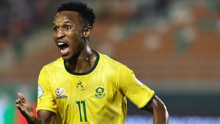 South Africa&#039;s forward #11 Themba Zwane celebrates scoring his team&#039;s second goal against Namibia