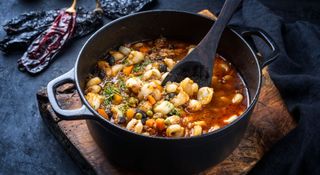 Black cast iron Dutch oven filled with a stew