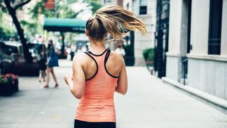 A photo of a woman running in New York