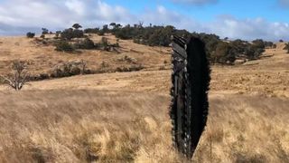 The 10 foot seared spike was found standing upright in a sheep farm.