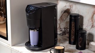 GE Profile Smart Grind & Brew coffee maker on kitchen counter