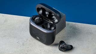 A pair of JBL Tour Pro 2 wireless earbuds in black