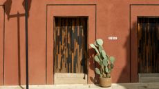 Otro Oaxaca's terracotta entrance walls