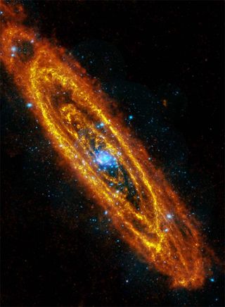 This image of the Andromeda Galaxy is a composite of an infrared photo from ESA's Herschel space telescope and the XMM-Newton’s X-ray telescope. The infrared frame shows rings of dust that trace gaseous reservoirs where new stars are forming and the X-ray image shows stars approaching the ends of their lives.