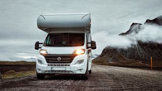 RV parked in a dramatic landscape