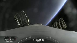 A stunning view of the Earth at dawn from space is seen in this still image from video taken by SpaceX's Falcon 9 rocket first stage during the launch of the NROL-85 spy satellite on April 17, 2022.