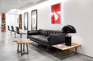 Sofa and table inside Takamichi hair salon, on of Wallpaper's pick of New York salons