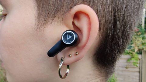 A photo showing a close-up of the Lypertek PurePlay Z5 earbuds in a users&#039; ear