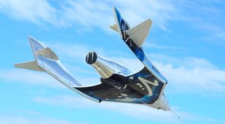 futuristic looking plane soars against a blue sky.