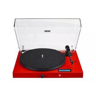 Pro-Ject Juke Box E record player in red finish with lid on white background