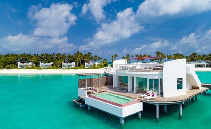 An aerial view image of the hotel villas