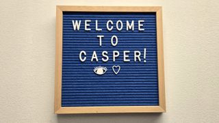 A &quot;Welcome to Casper!&quot; sign greets our sleep writer as she visits Casper Labs in Brooklyn.