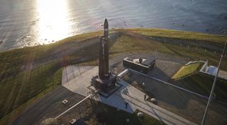 Rocket Lab's second Electron rocket stands on its New Zealand pad prior to a series of launch attempts in December 2017. A new window for the launch opens in late January 2018.