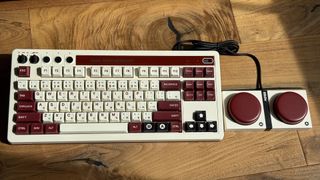 8BitDo Retro Mechanical Keyboard on a wooden floor