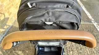 a photo of the vegan handlebar on the Nuna MIXX Next