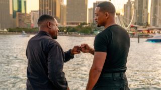 Marcus (Martin Lawrence) and Mike (Will Smith) fist bump in Bad Boys: Ride Or Die 